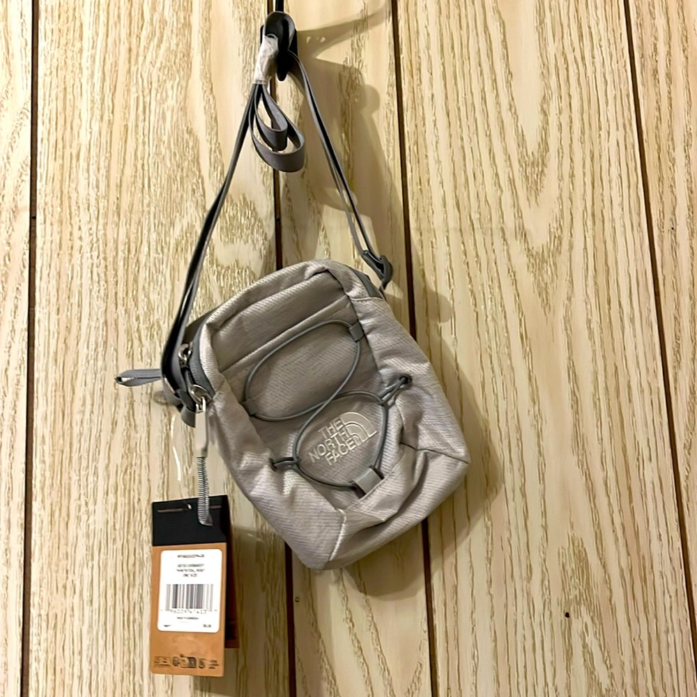 The North Face crossbody light grey $18